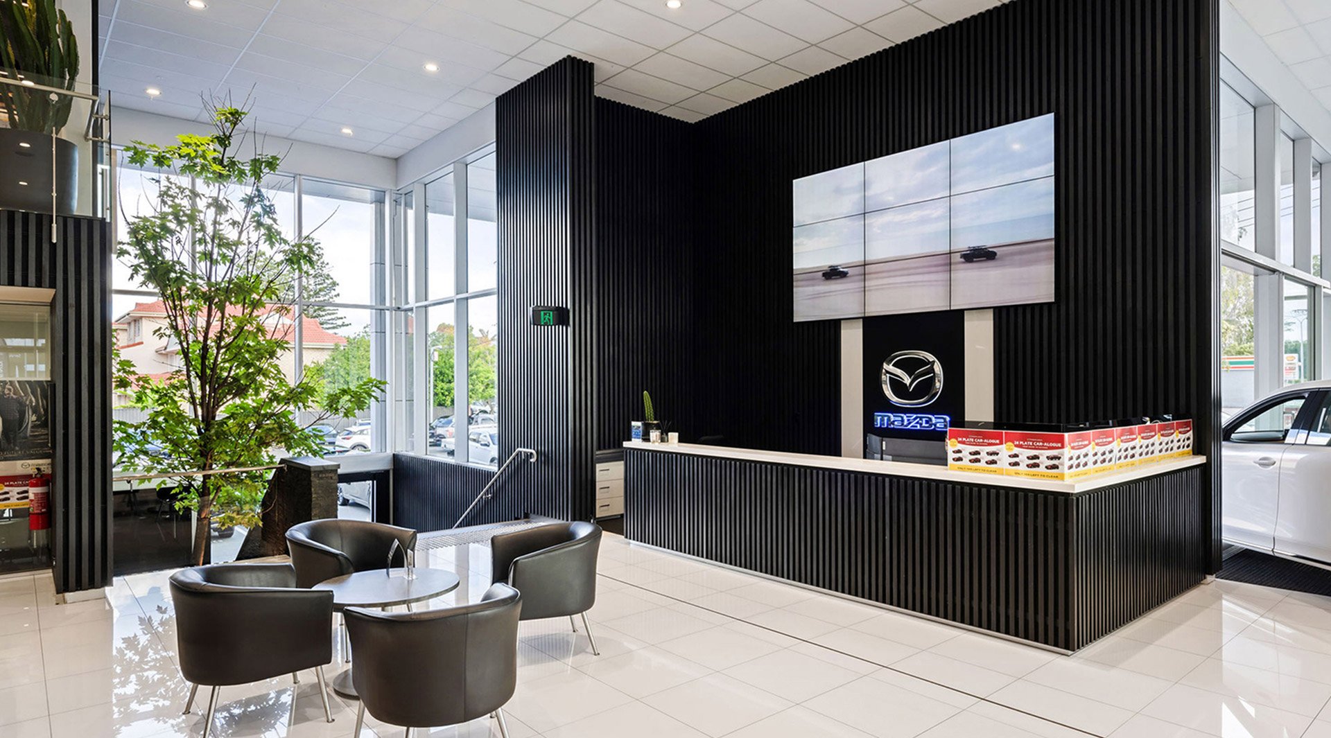 Aspley Mazda Reception with floor to ceiling Sculptform Click-on Battens