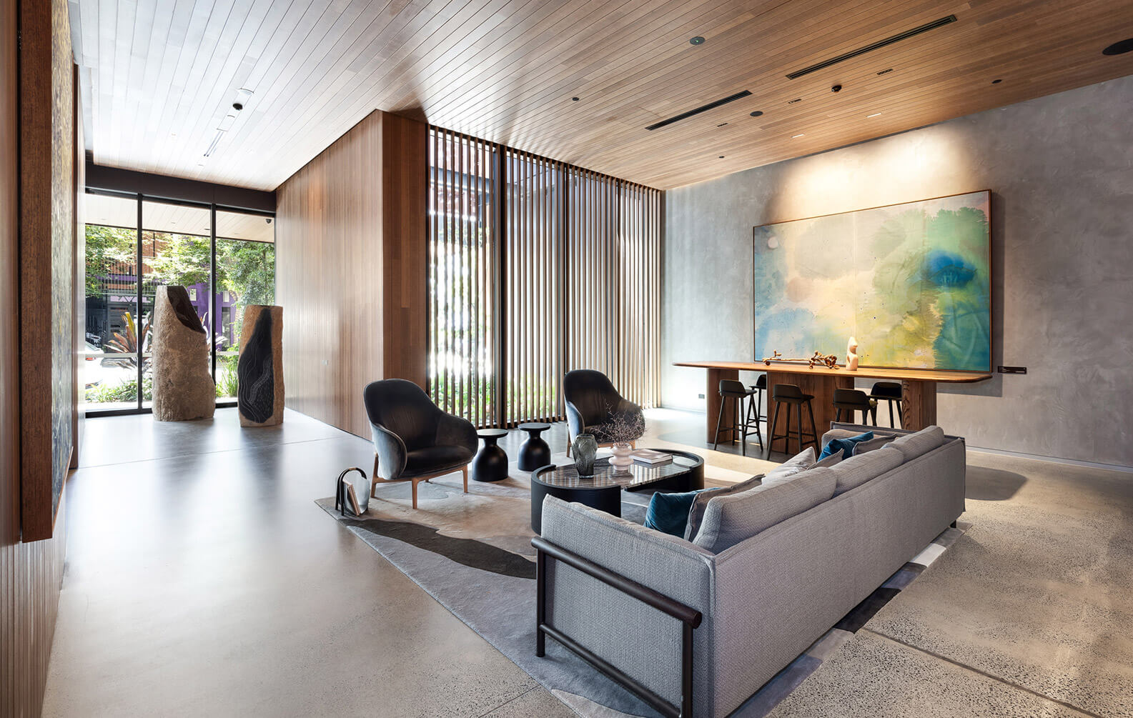 Upper House foyer, click-on batten screen overlay windows and tongue and groove cladding creates wall to ceiling feature